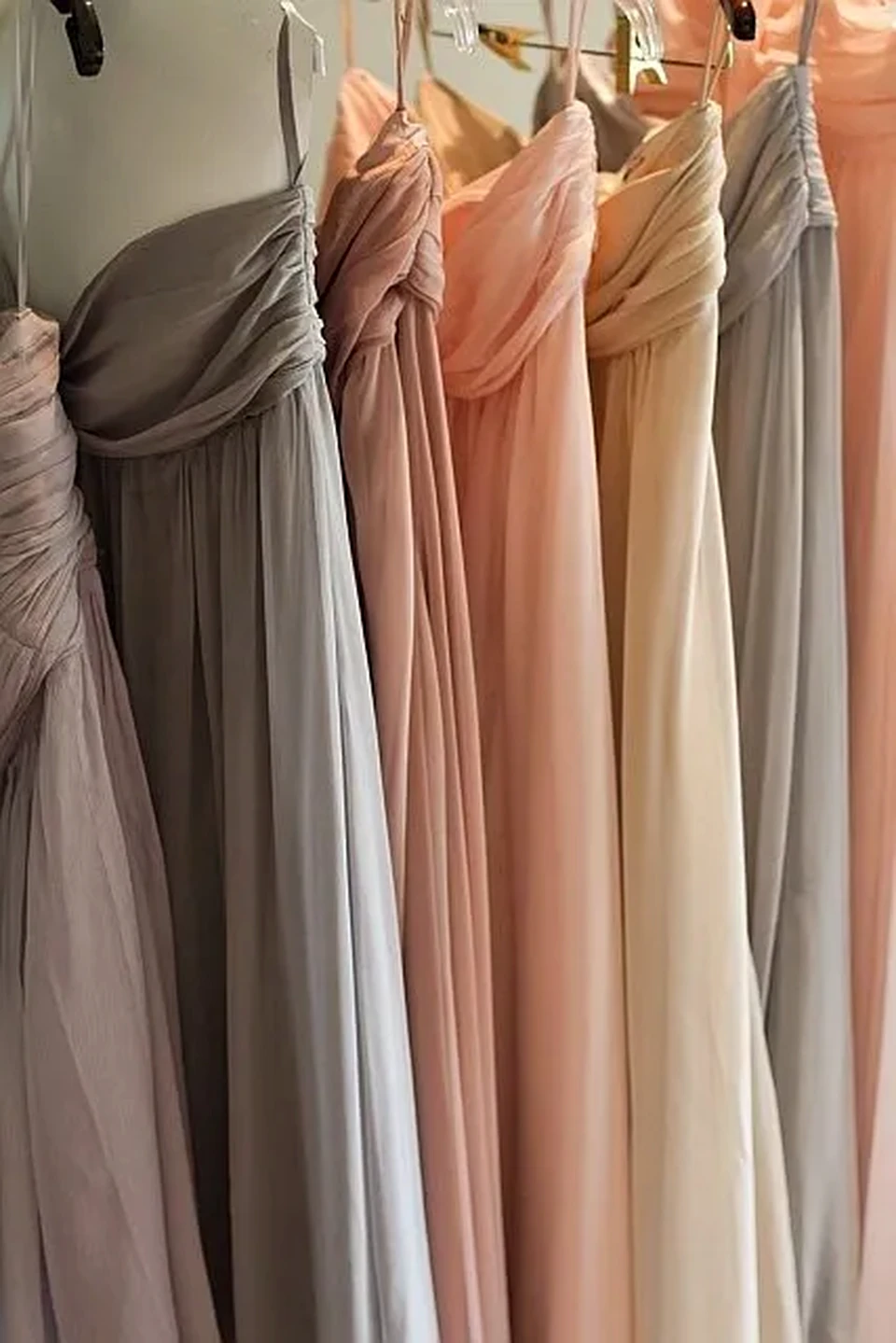 Bridesmaid dresses in soft neutral colours