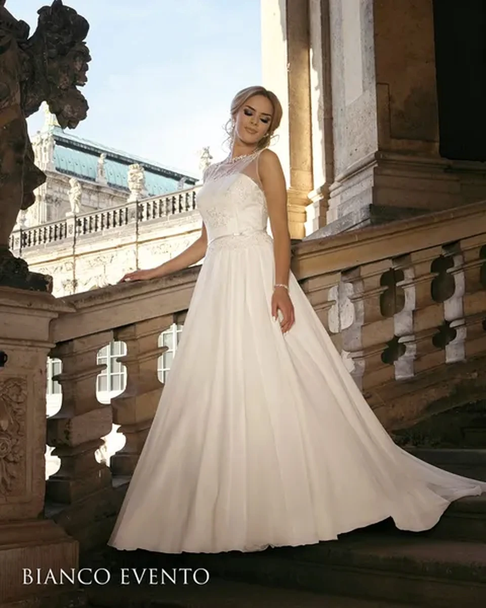 Elegant bride wearing a flowing white wedding dress